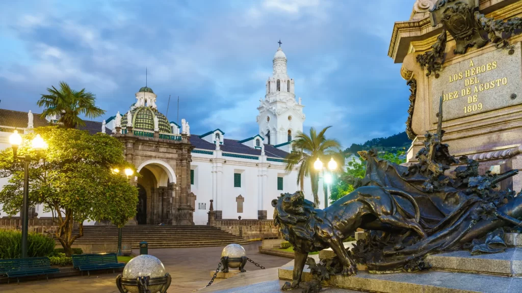 The Monument of August 10th in Quito's Historic Center, surrounded by colonial architecture. Catedral Metropolitana