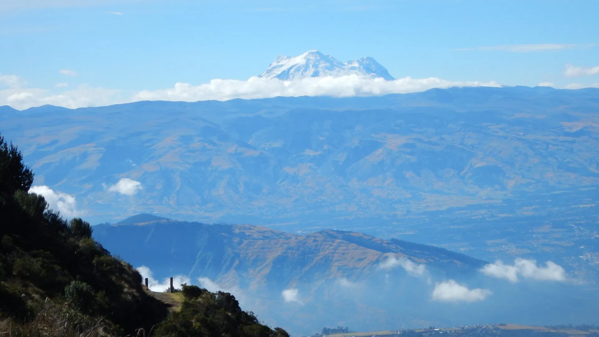 The image shows Cayambe Volcano, the third highest mountain in Ecuador.