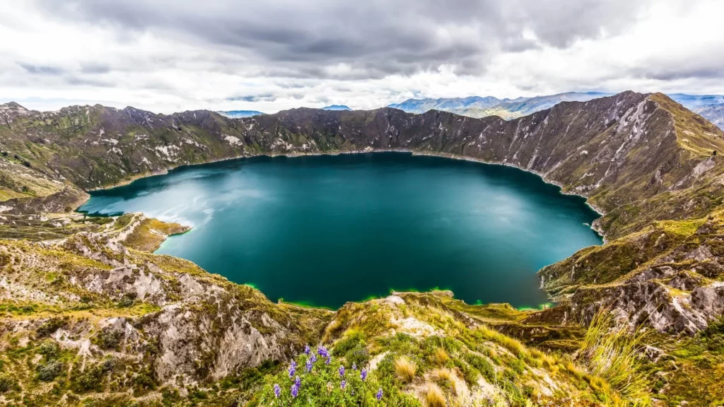 Quilotoa dazzles with its crater and turquoise water surrounded by mountains-Ecuadorian Andes travel 