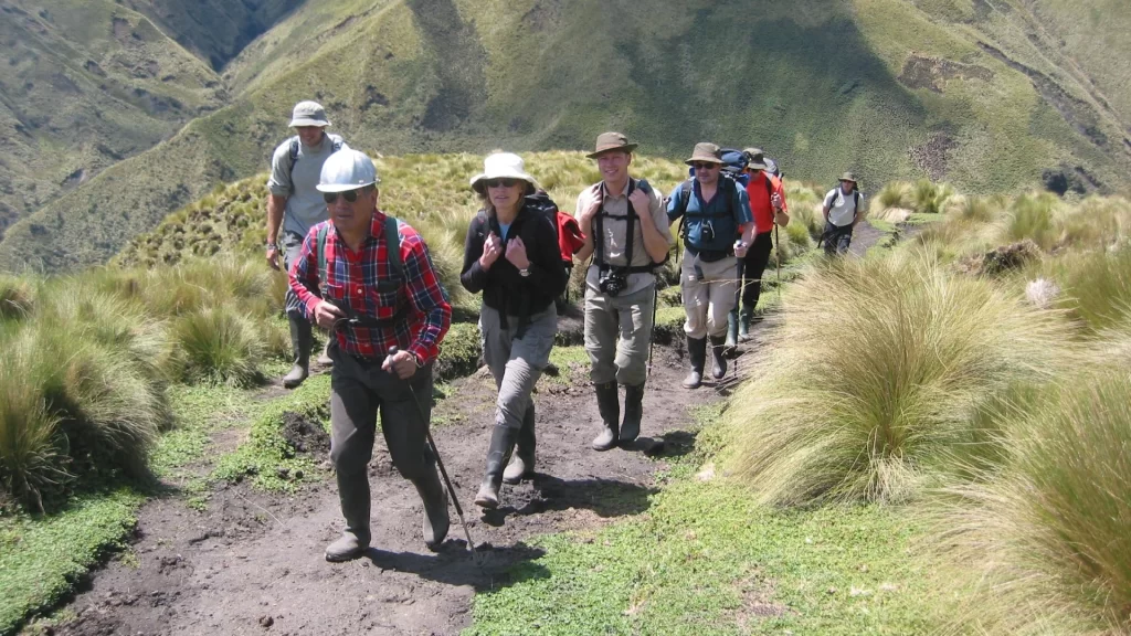Group of hikers follows an expert local guide-Trekking in Ecuador