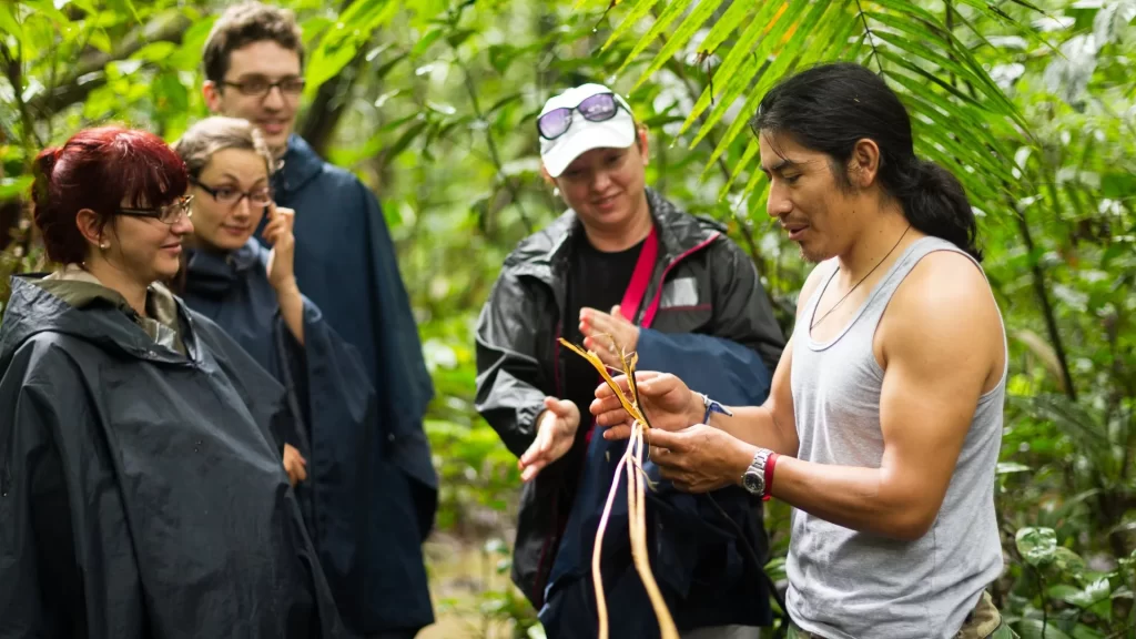 Local guide teaches tourists about Andean wildlife and ecology-Amazon travel
