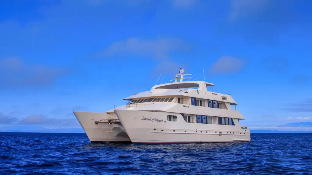 The Treasure of Galápagos catamaran sails elegantly over turquoise waters- is a trip to Galapagos worth it
