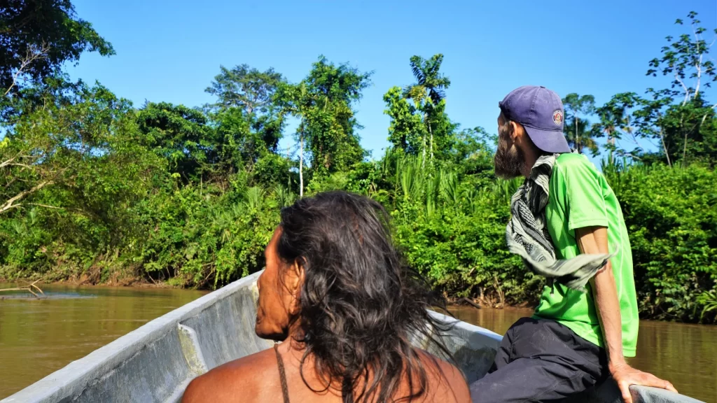 Canoe or kayak expedition in Yasuni National Park, Ecuadorian Amazon, during a multi-day jungle adventure.