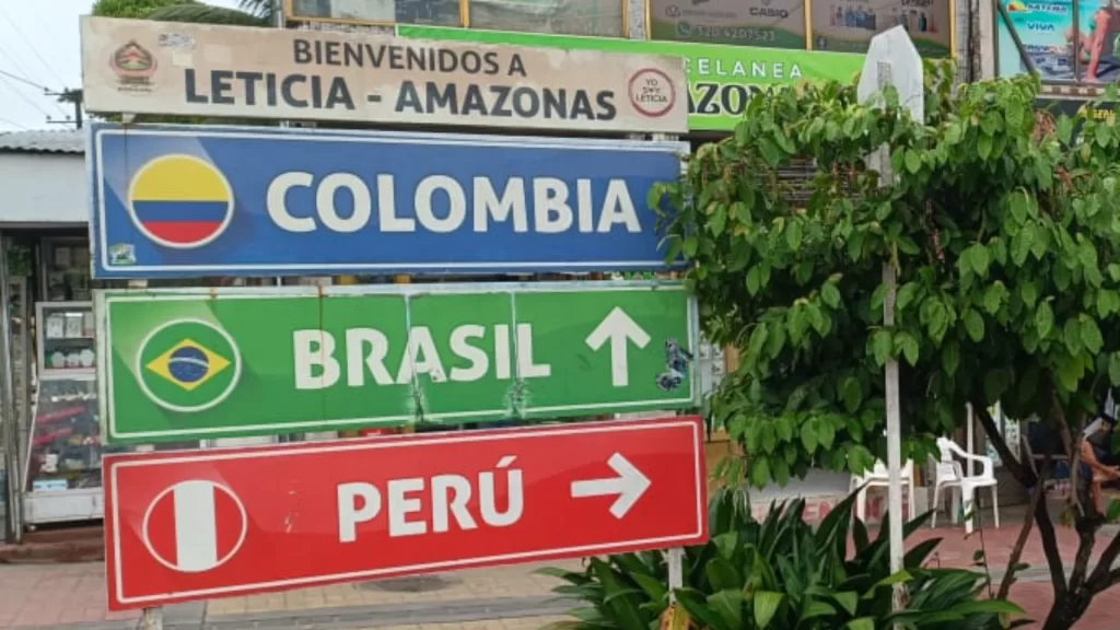 Welcome sign to Leticia, showing the proximity of Colombia, Brazil, and Peru-Leticia Amazon