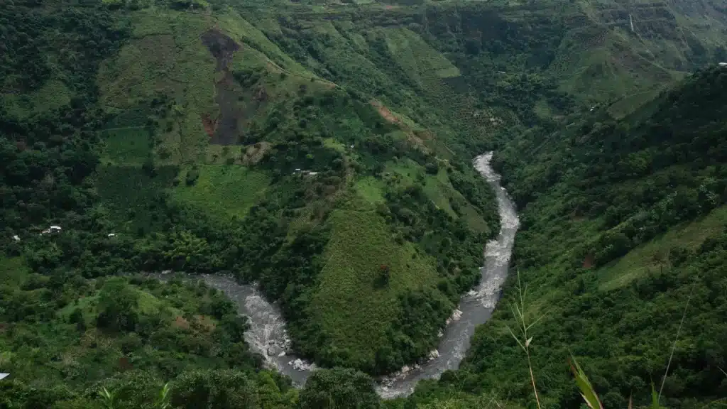 Expansive view of the Magdalena River surrounded by green islets near Neiva in the Huila department of Colombia