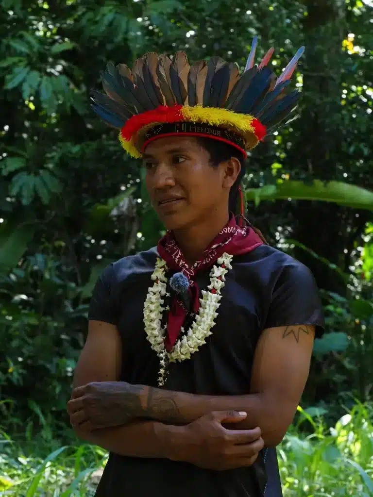 Representative of the Secoya (Siekopai) nationality wearing traditional tunic and necklaces in the Cuyabeno Reserve.