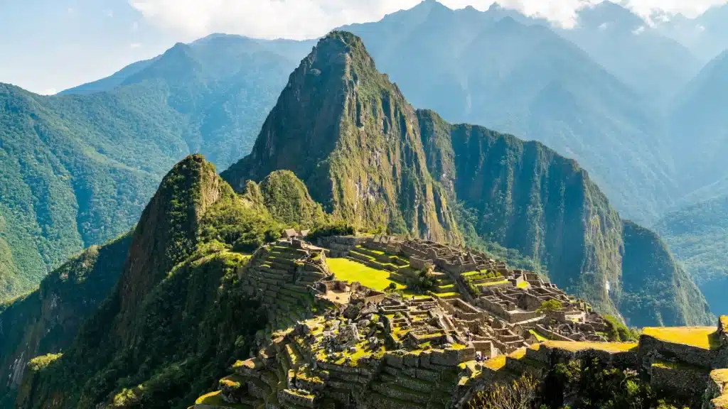 Machu Picchu in Peru surrounded by Andean mountains.