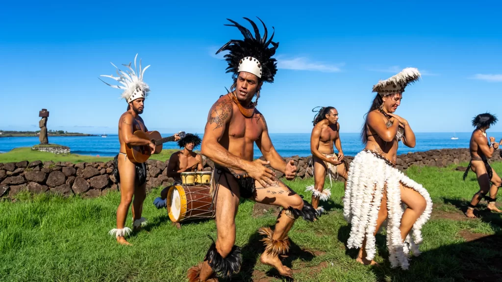 Rapa Nui dancers performing ancestral ceremonies on Easter Island, reflecting the living culture behind the Easter Island stone giants.