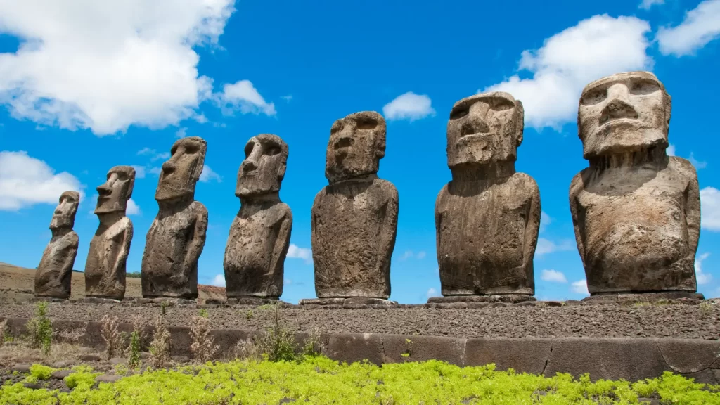Easter Island stone giants standing on ceremonial ahu, revealing ancestral heritage and landscape design.